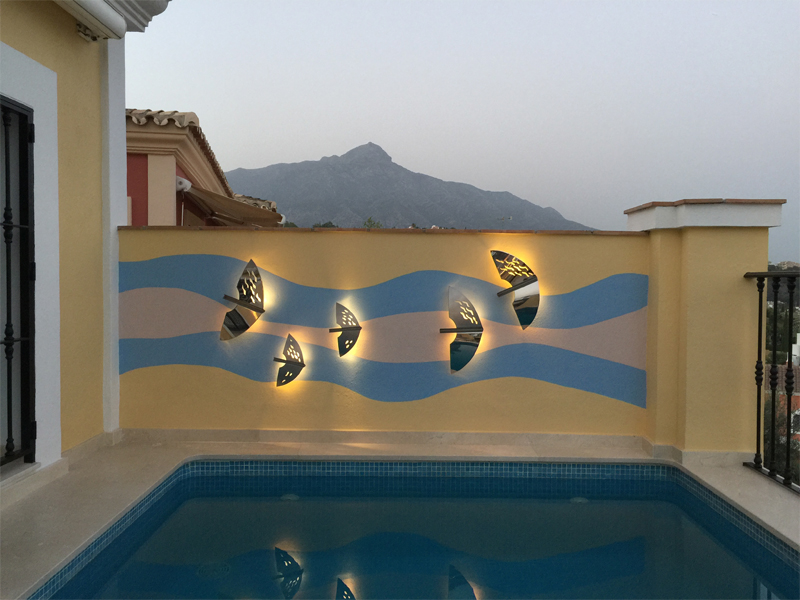  By the pool decoration in steel led lights 